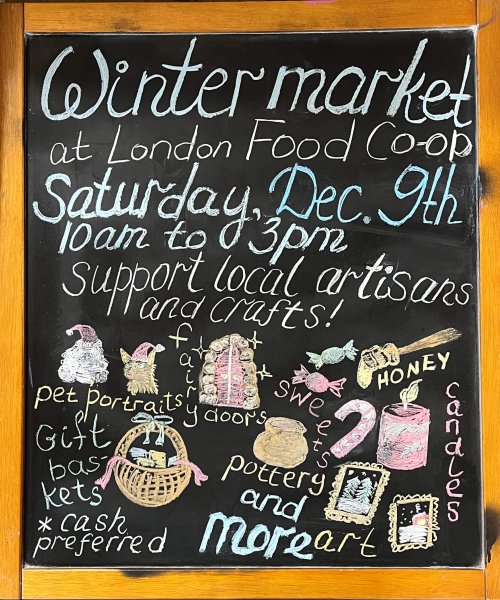 A black-board sign with a handwritten ad in chalk: "Winter Market at London Food Co-op Saturday Dec 9th 10 am to 3pm Support local artisans and carfts!" Hand drawings of products addorn the bottom of the sign.